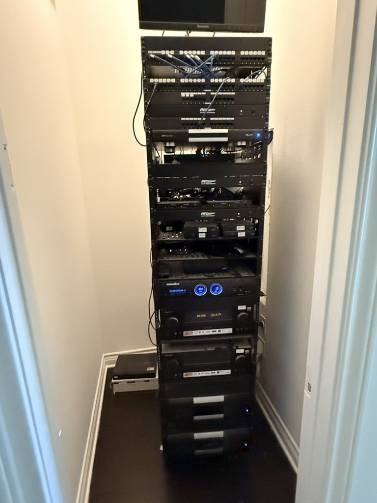Custom AV equipment rack with amplifiers and network streamer